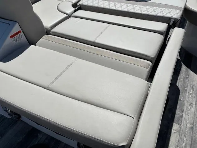 Slide: The Image of 2019 Crest Savannah 250 SLS boat with gray cushioned seating. - 12