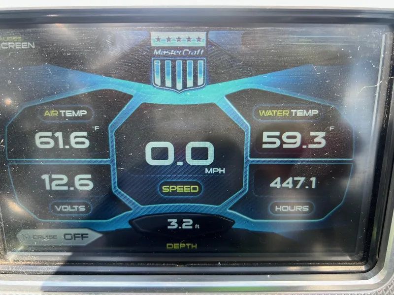 Slide: The Image of Dashboard of a 2013 MasterCraft X-25 showing air and water temperatures, speed, and hours. - 20
