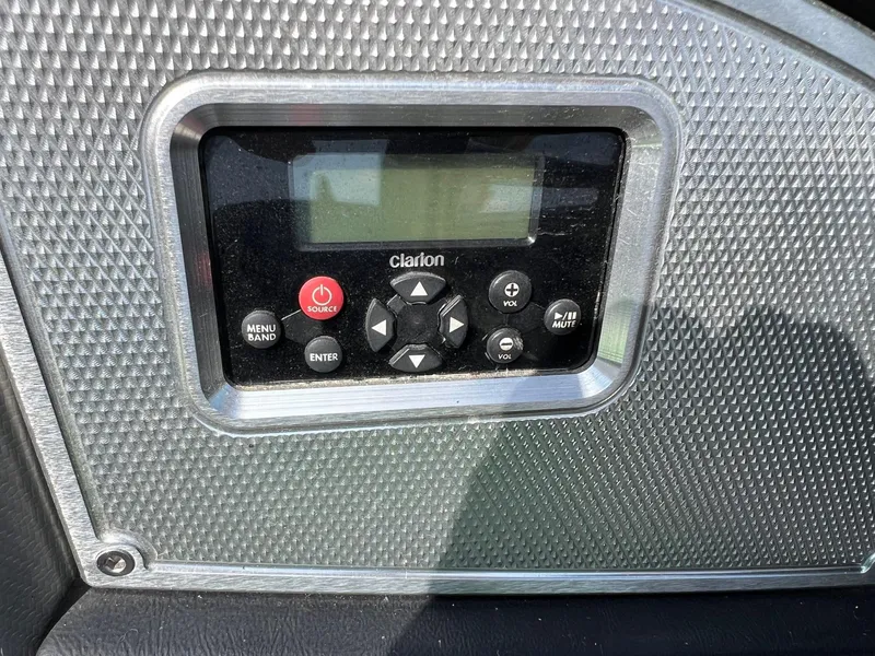 Slide: The Image of 2013 MasterCraft X-25 Clarion stereo system with textured metal panel. - 23