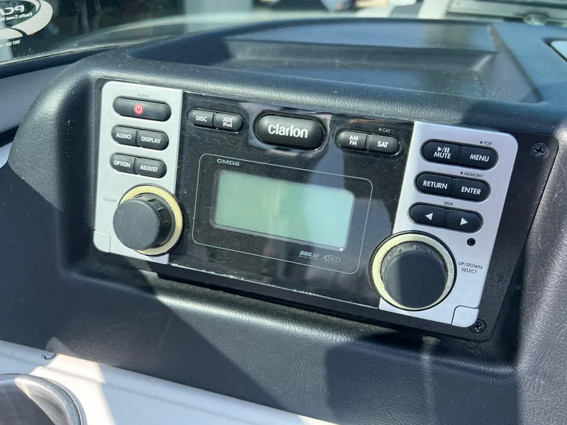 Slide: The Image of Clarion CMD6 stereo system in 2013 MasterCraft X-25 boat dashboard. - 25