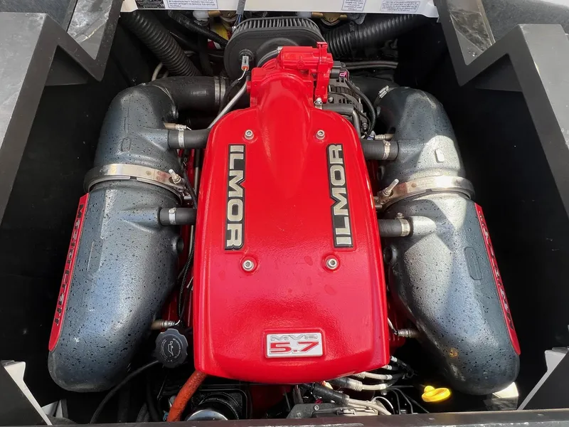Slide: The Image of 2013 MasterCraft X-25 Ilmor MV8 5.7 engine, red cover, detailed view. - 38