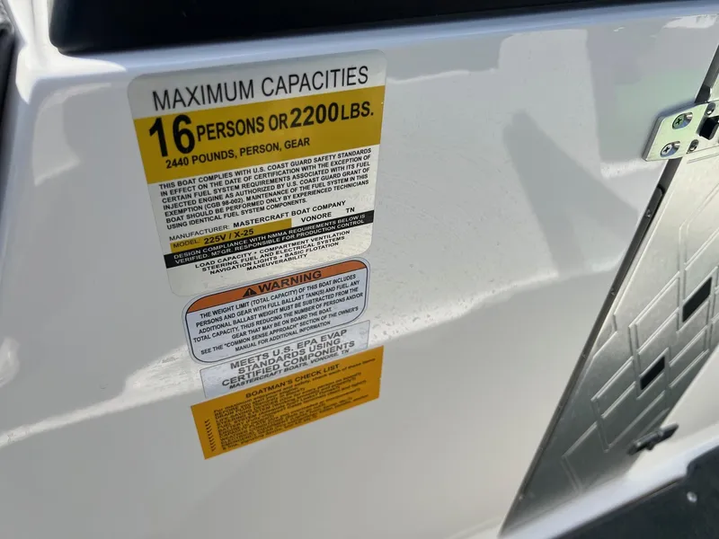 Slide: The Image of 2013 MasterCraft X-25 capacity label, maximum 16 persons or 2200 lbs. - 47