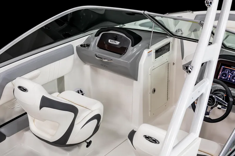 Slide: The Image of 2025 Chaparral 21 SSi OB boat interior with modern dashboard and seating. - 16