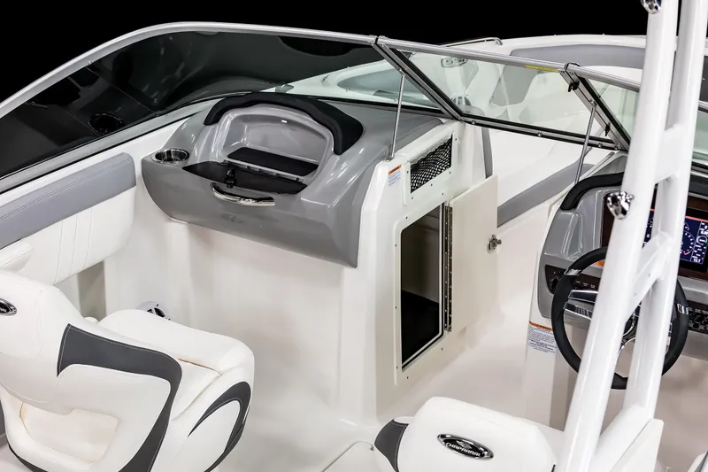 Slide: The Image of 2025 Chaparral 21 SSi OB boat interior with modern dashboard and seating. - 17