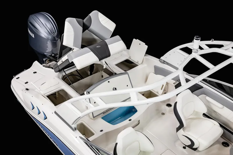 Slide: The Image of 2025 Chaparral 21 SSi OB boat interior with seating and Yamaha outboard motor. - 23