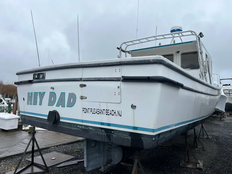 Slide: The Image of Provincial 42 Fishing Boat, 1999, named "Hey Dad," docked at Point Pleasant Beach, NJ. - 2
