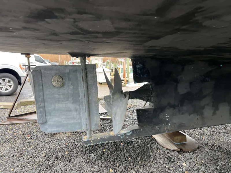 Slide: The Image of Underside view of a 1999 Provincial 42 Fishing Boat's propeller and rudder. - 5