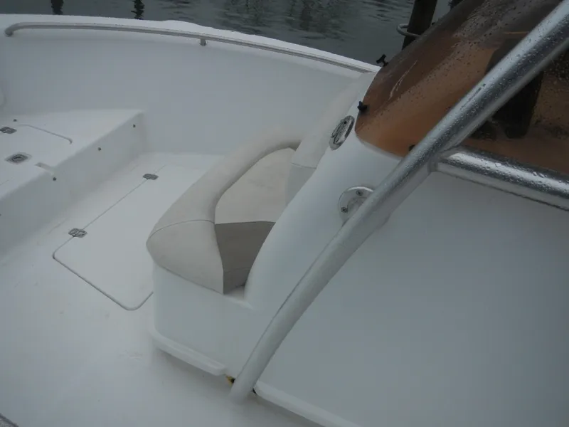 Slide: The Image of 2007 Polar 2100 Center Console boat interior with seating and storage compartments. - 10