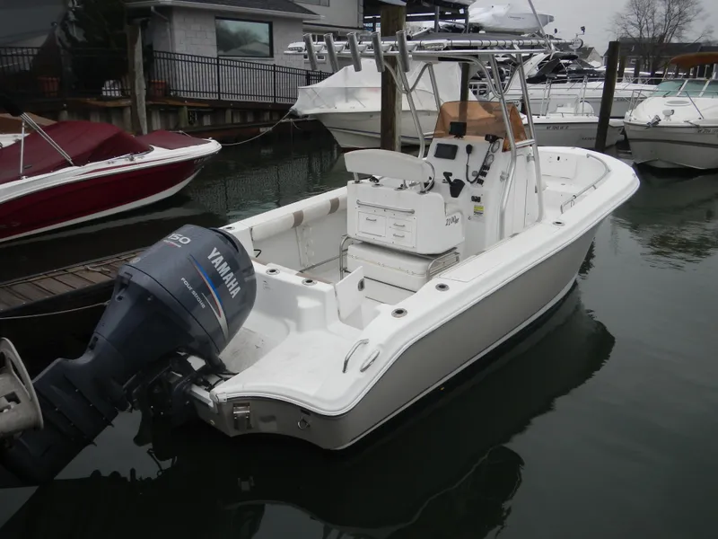 Slide: The Image of 2007 Polar 2100 Center Console boat with Yamaha engine docked at marina. - 4