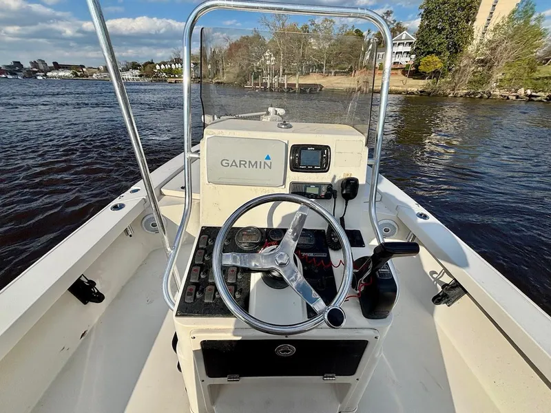 Slide: The Image of 2011 Pathfinder 2300 HPS boat with Garmin navigation on a calm river. - 10