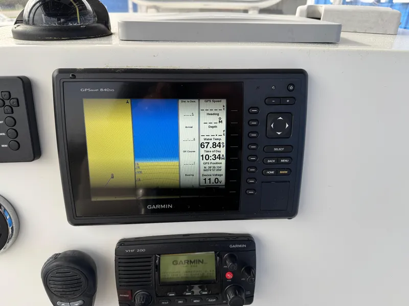 Slide: The Image of Garmin GPS display on 2016 Parker 2300 Special Edition boat dashboard. - 14