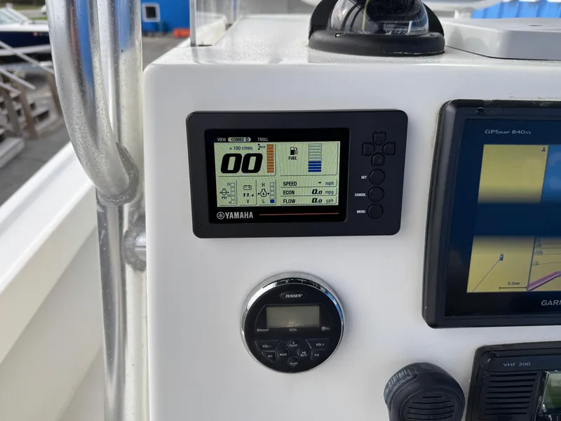 Slide: The Image of 2016 Parker 2300 Special Edition boat dashboard with Yamaha display and Garmin GPS. - 15