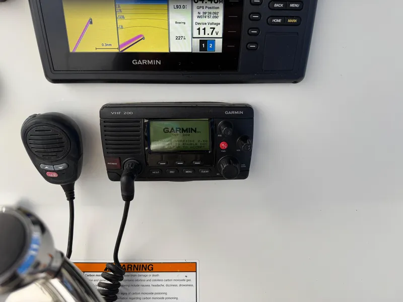 Slide: The Image of Garmin marine electronics on Parker 2300 Special Edition, 2016 model, featuring GPS and VHF radio. - 16