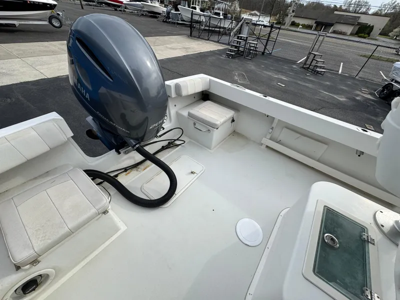 Slide: The Image of 2016 Parker 2300 Special Edition boat interior with Yamaha outboard motor. - 6