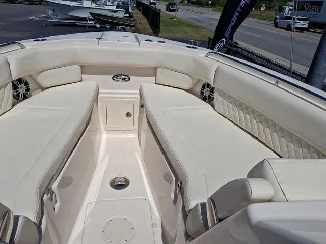 Slide: The Image of 2025 Grady-White Freedom 307 boat interior with spacious seating and modern design. - 15