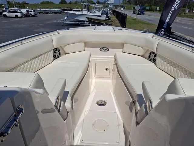 Slide: The Image of 2025 Grady-White Freedom 307 boat interior with spacious seating and elegant design. - 18