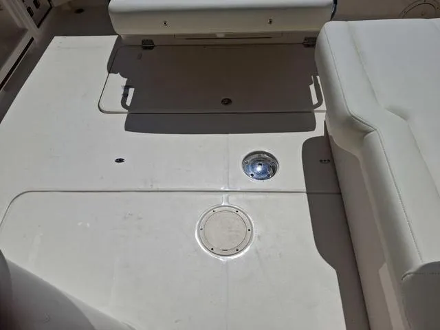 Slide: The Image of 2025 Grady-White Freedom 307 boat interior with white seating and deck. - 28