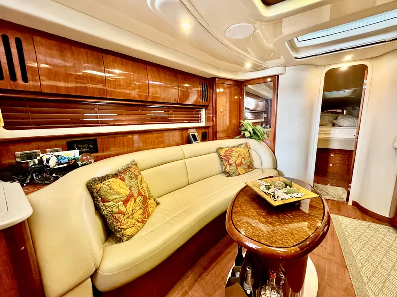 Slide: The Image of Luxurious interior of 2004 Sea Ray 420 Sundancer yacht with elegant wood finishes. - 15