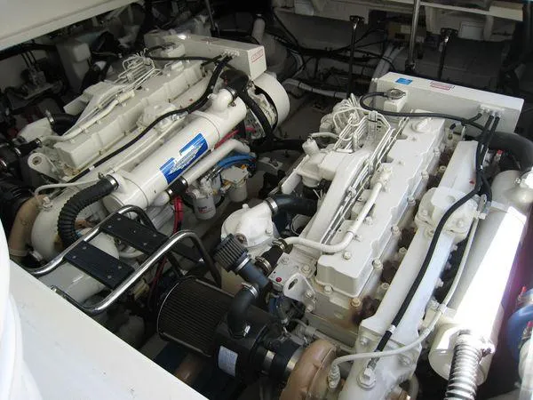 Slide: The Image of Engine room of 2004 Sea Ray 420 Sundancer with dual engines. - 29