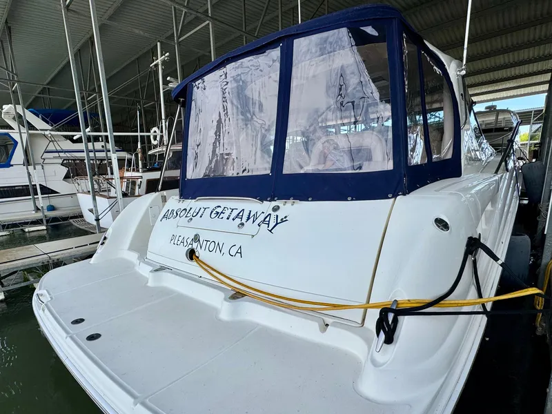 Slide: The Image of 2004 Sea Ray 420 Sundancer docked, featuring "Absolut Getaway" from Pleasanton, CA. - 7