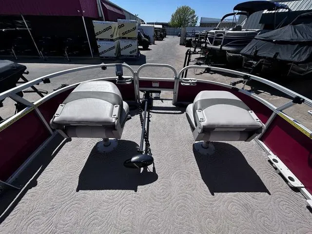 Slide: The Image of 2014 Sun Tracker Bass Buggy 18 DLX pontoon boat with dual seats and trolling motor. - 12