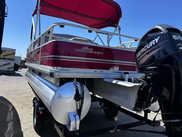 Slide: The Image of 2014 Sun Tracker Bass Buggy 18 DLX pontoon boat with Mercury outboard motor. - 5
