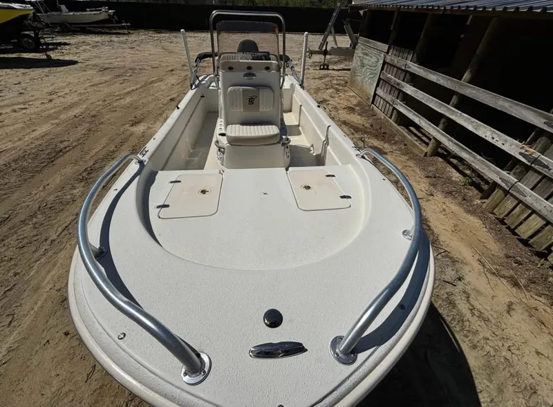 Slide: The Image of 2017 Carolina Skiff 18 JVX CC boat on sandy ground, front view. - 9