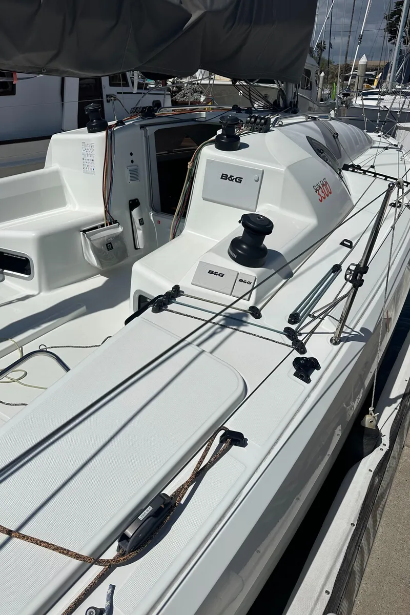 Slide: The Image of 2021 Jeanneau Sun Fast 3300 sailboat deck with rigging and winches. - 10