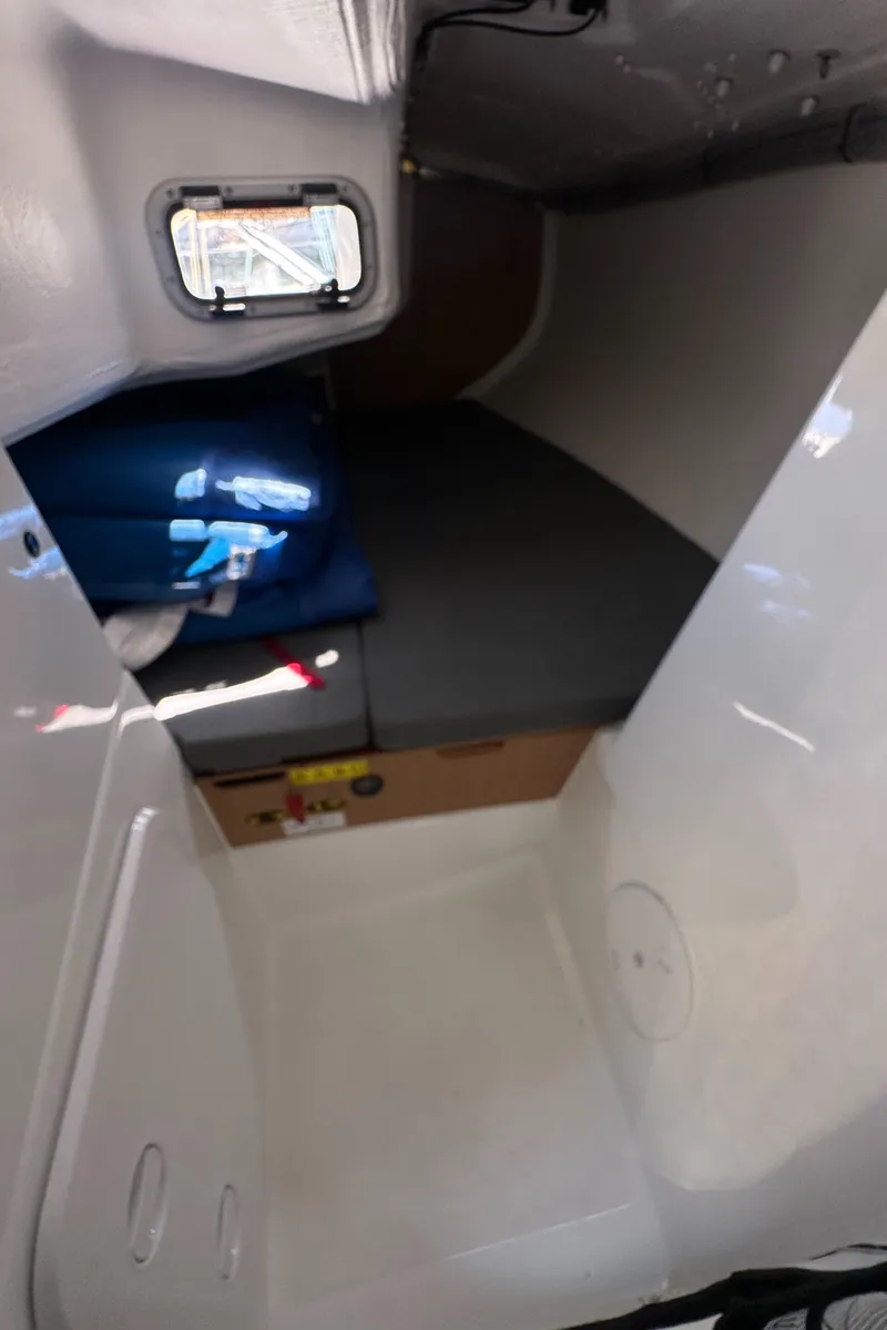 Slide: The Image of 2021 Jeanneau Sun Fast 3300 cabin interior with compact sleeping area. - 30