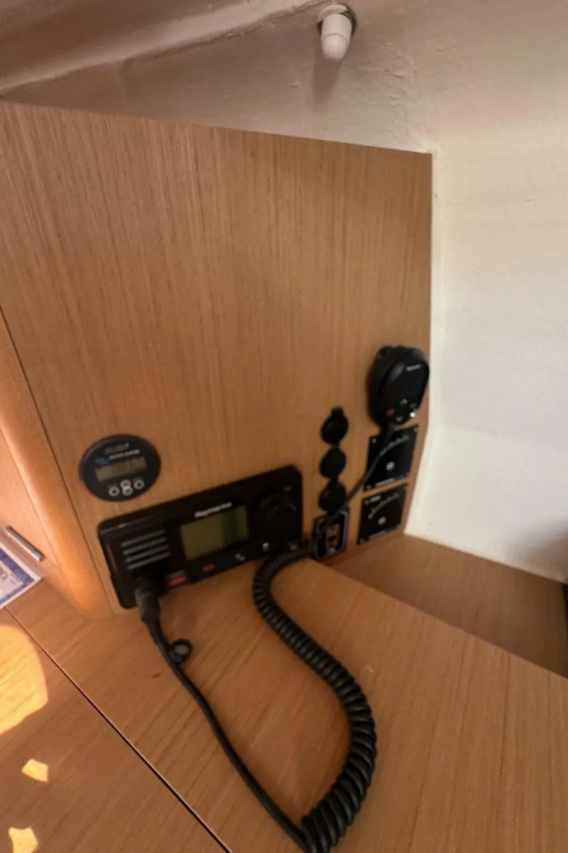 Slide: The Image of Control panel inside 2021 Jeanneau Sun Fast 3300 yacht, featuring communication equipment. - 31