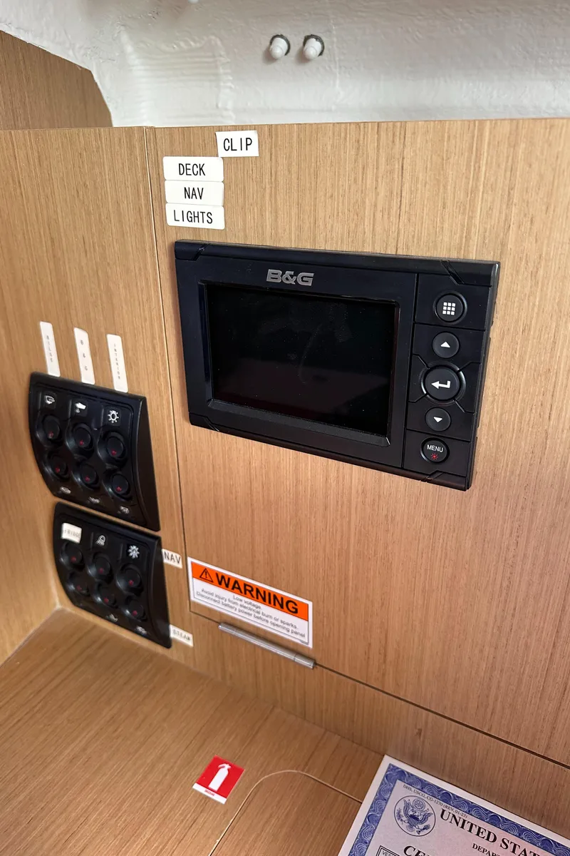Slide: The Image of Control panel of 2021 Jeanneau Sun Fast 3300 sailboat with navigation system. - 38