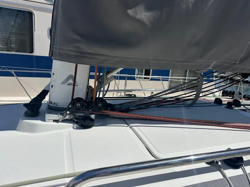 Slide: The Image of Jeanneau Sun Fast 3300 sailboat deck, showcasing rigging and mast details, 2021 model. - 6