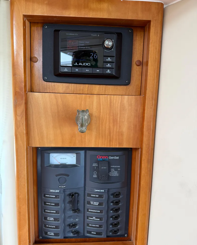 Slide: The Image of Control panel of a 2007 Riviera 3600 Sport Yacht with JL Audio system. - 29