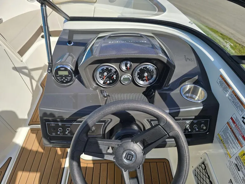 Slide: The Image of 2019 Bayliner VR5 Bowrider OB dashboard with steering wheel and instrument panel. - 3