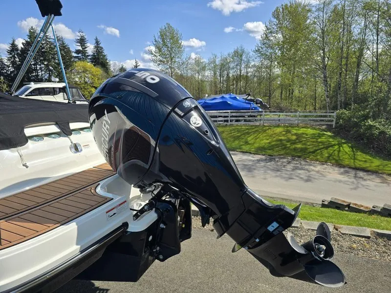 Slide: The Image of 2019 Bayliner VR5 Bowrider OB with Mercury outboard motor, parked outdoors. - 7