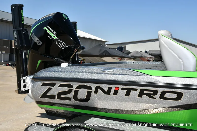 Slide: The Image of 2021 Nitro Z20 Pro Pack boat with Mercury 250 engine, green and silver design. - 17