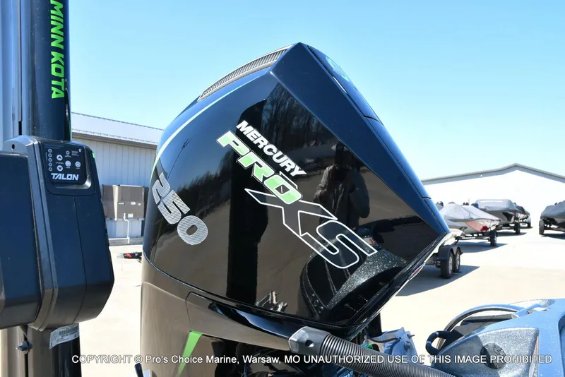 Slide: The Image of 2021 Nitro Z20 Pro Pack with Mercury Pro XS 250 engine in a marina setting. - 21