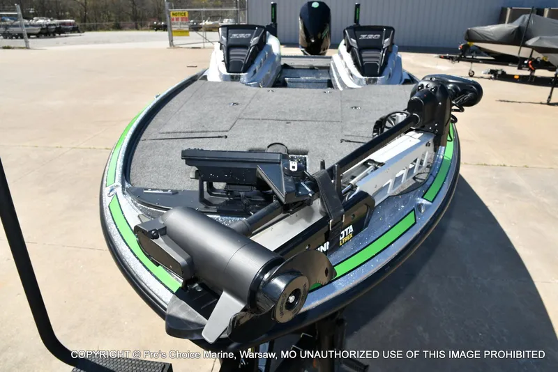 Slide: The Image of 2021 Nitro Z20 Pro Pack boat with Minn Kota trolling motor, parked outdoors. - 31