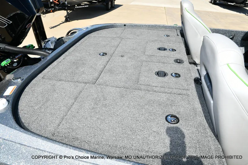 Slide: The Image of 2021 Nitro Z20 Pro Pack boat interior with gray carpet and seating. - 38