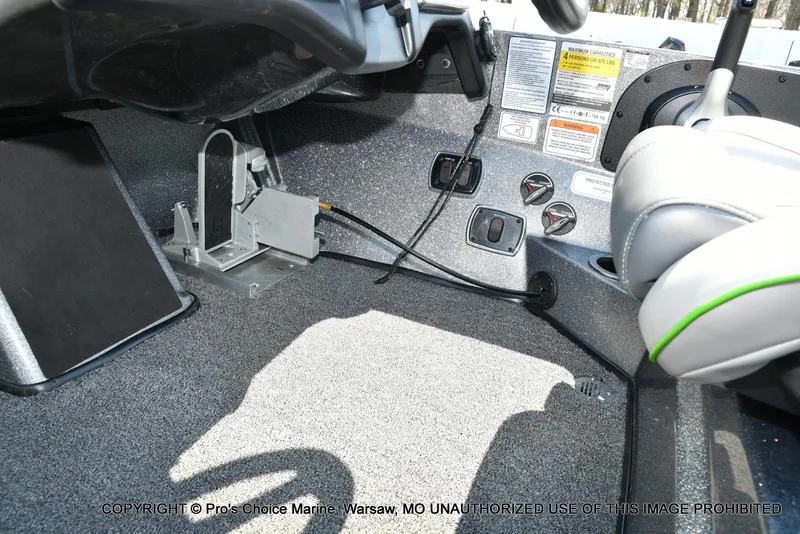 Slide: The Image of Interior of 2021 Nitro Z20 Pro Pack boat showing controls and foot pedal. - 47