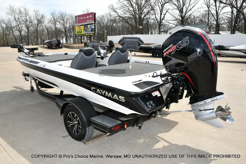 Slide: The Image of 2023 Caymas CX 18 boat with 150 Mercury Pro-XS 4 Stroke engine, parked outdoors. - 26