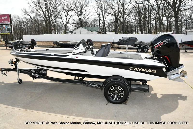 Slide: The Image of 2023 Caymas CX 18 boat with 150 Mercury Pro-XS engine on trailer. - 27