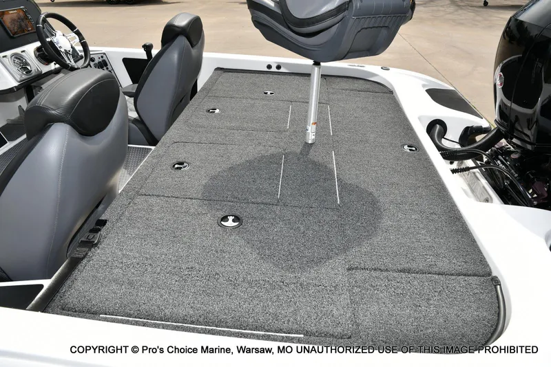 Slide: The Image of 2023 Caymas CX 18 boat interior with seating and storage compartments. - 43