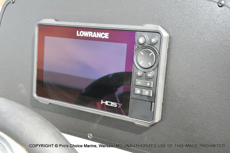 Slide: The Image of Lowrance HDS-7 fishfinder on 2023 Caymas CX 18 boat dashboard. - 7