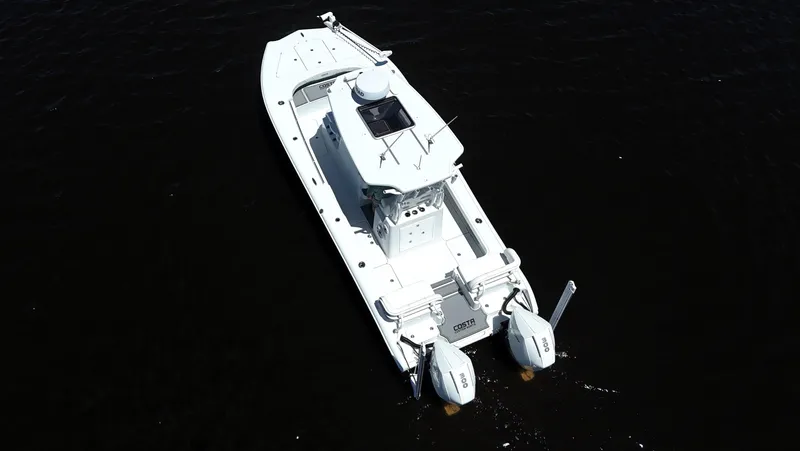 Slide: The Image of 2022 Costa Custom Boats 264 HC on dark water, aerial view. - 17