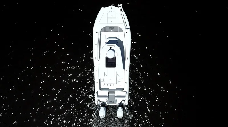 Slide: The Image of Overhead view of 2022 Costa Custom Boats 264 HC on dark water. - 18
