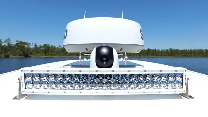 Slide: The Image of 2022 Costa Custom Boats 264 HC with advanced radar and lighting system on a clear day. - 38