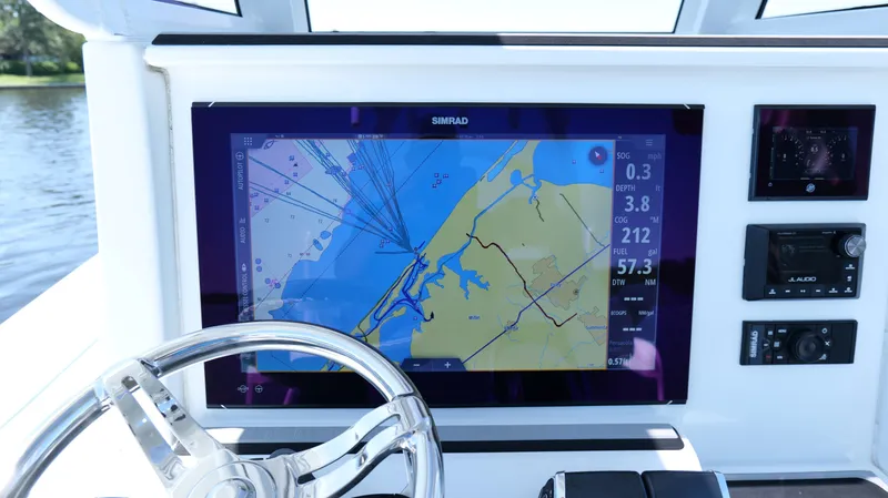 Slide: The Image of Navigation display on 2022 Costa Custom Boats 264 HC, featuring a detailed marine map. - 44