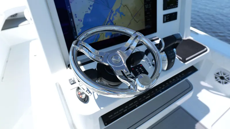 Slide: The Image of Steering wheel and controls of 2022 Costa Custom Boats 264 HC, featuring navigation display. - 46