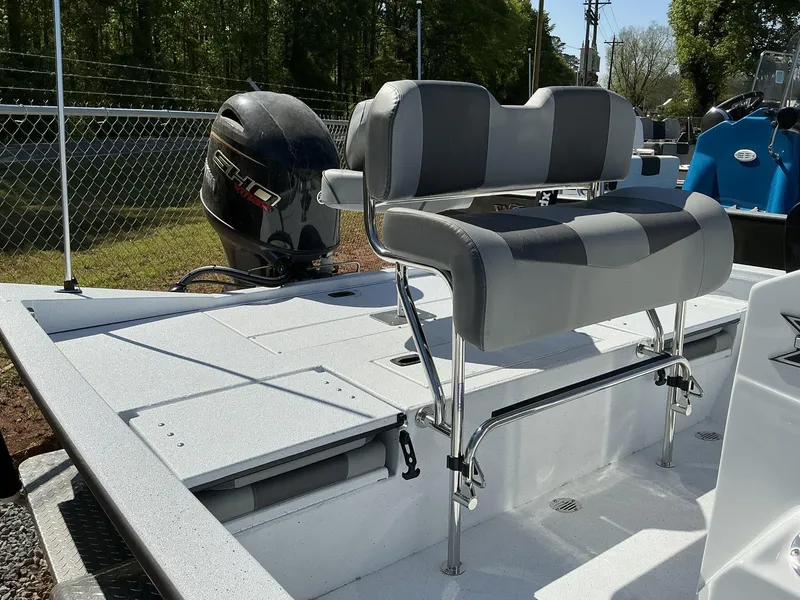 Slide: The Image of 2025 Xpress Hyper-Lift Series H20B boat with new console and seating, featuring a powerful outboard motor. - 2